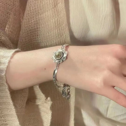 🔥【Compra 1 y llévate 1 gratis】Pulsera de loto giratoria con mantra de seis caracteres de la suerte 2026